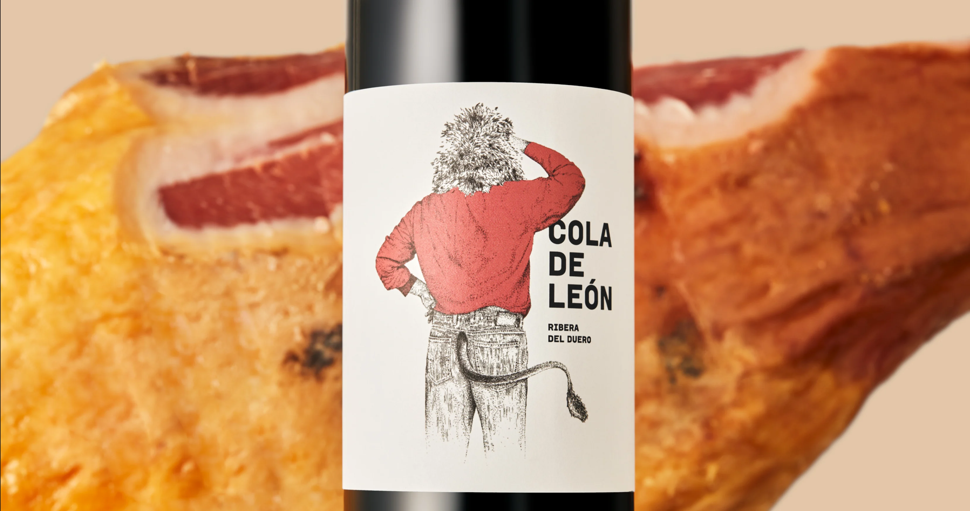 The Cola de León Ribera del Duero label — a lion in a red sweater