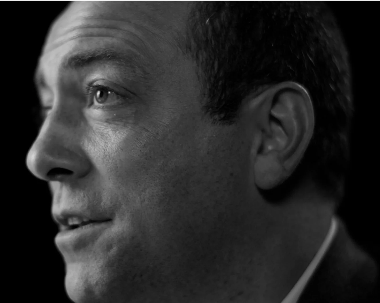 A black and white portrait from the brand photography
