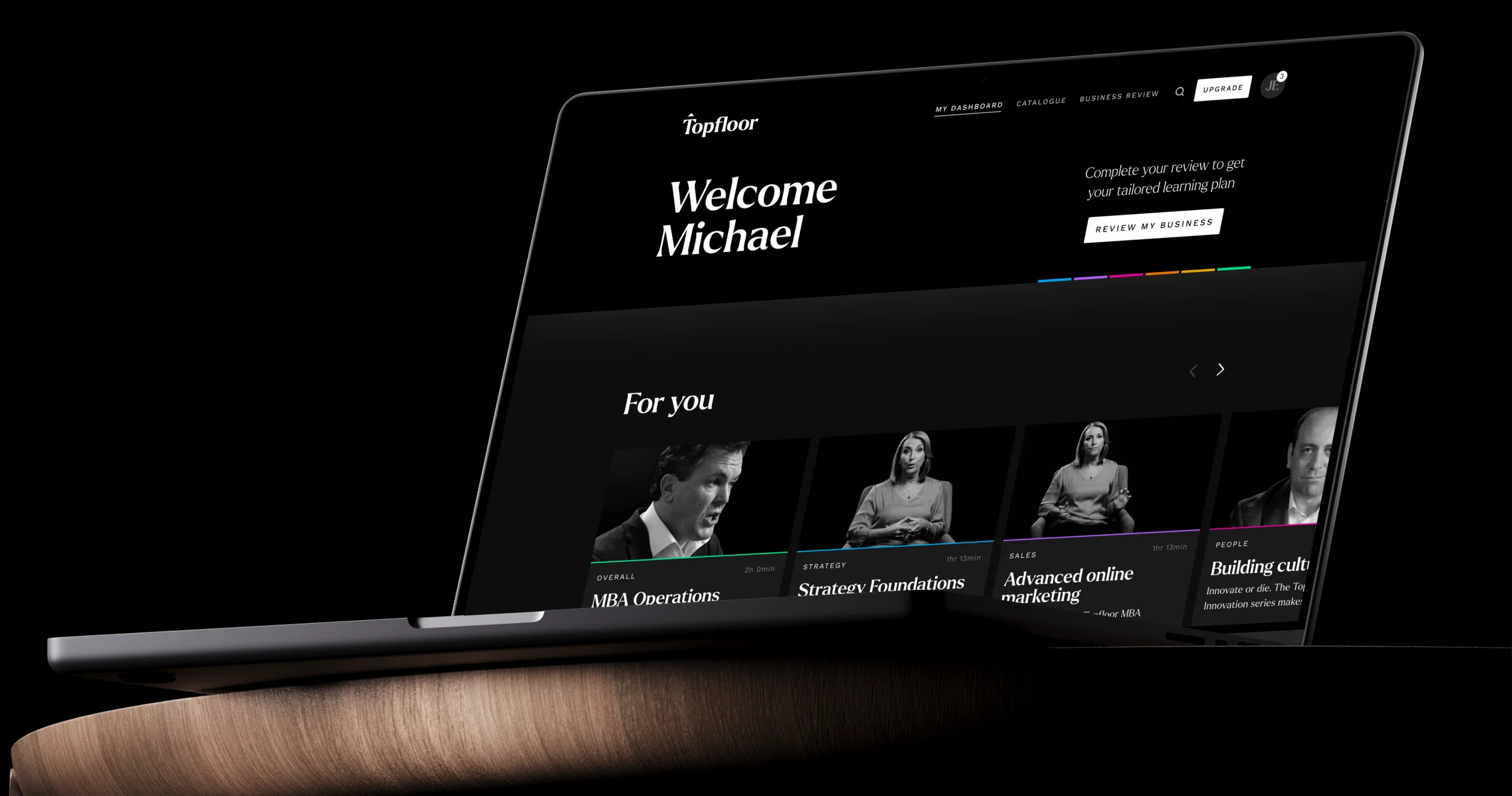 The personalised Welcome dashboard on a laptop